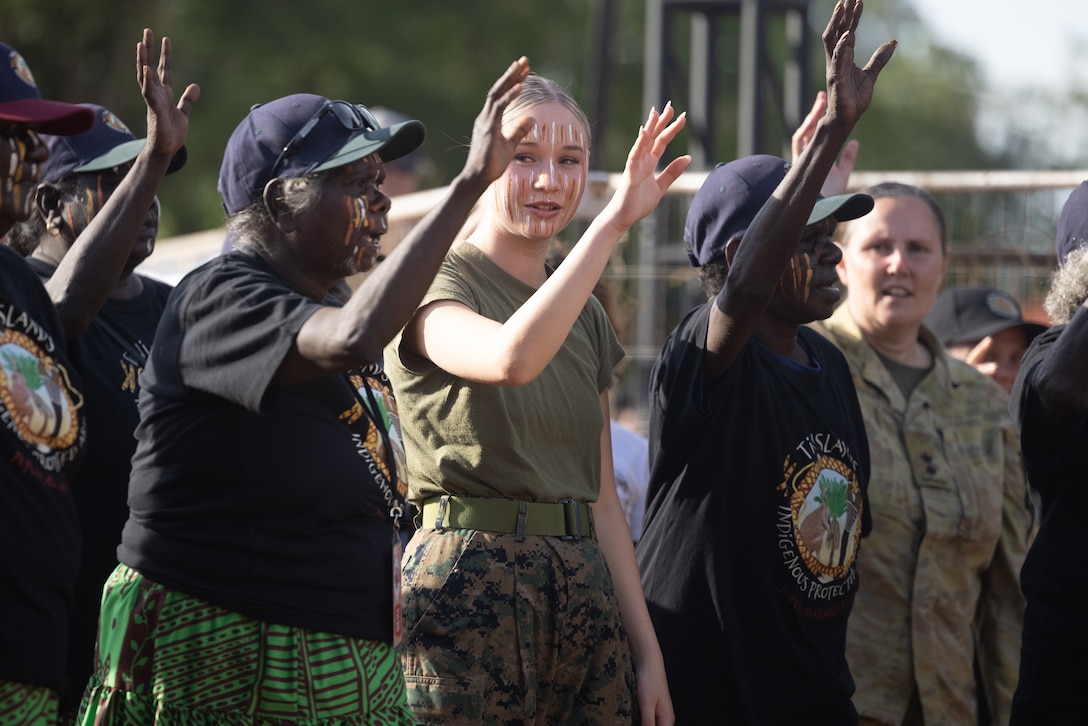 U.S. Marine Corps Lance Cpl. Trinity A. Leakey, an administrative specialist with Marine Rotational Force – Darwin 25.3, dances at the Tiwi Culture Festival, in the Tiwi Islands, Australia, July 19, 2025. Marines took part in the Tiwi Culture Festival in order to support the community, participate in cultural activities, and to promote an understanding of their traditions. MRF-D is an annual six-month rotational deployment to enhance interoperability with the Australian Defence Force and allies and partners and provide a forward postured crisis response force in the Indo-Pacific. Leakey is a native of Missouri. (U.S. Marine Corps photo by Cpl. Keegan Jones)