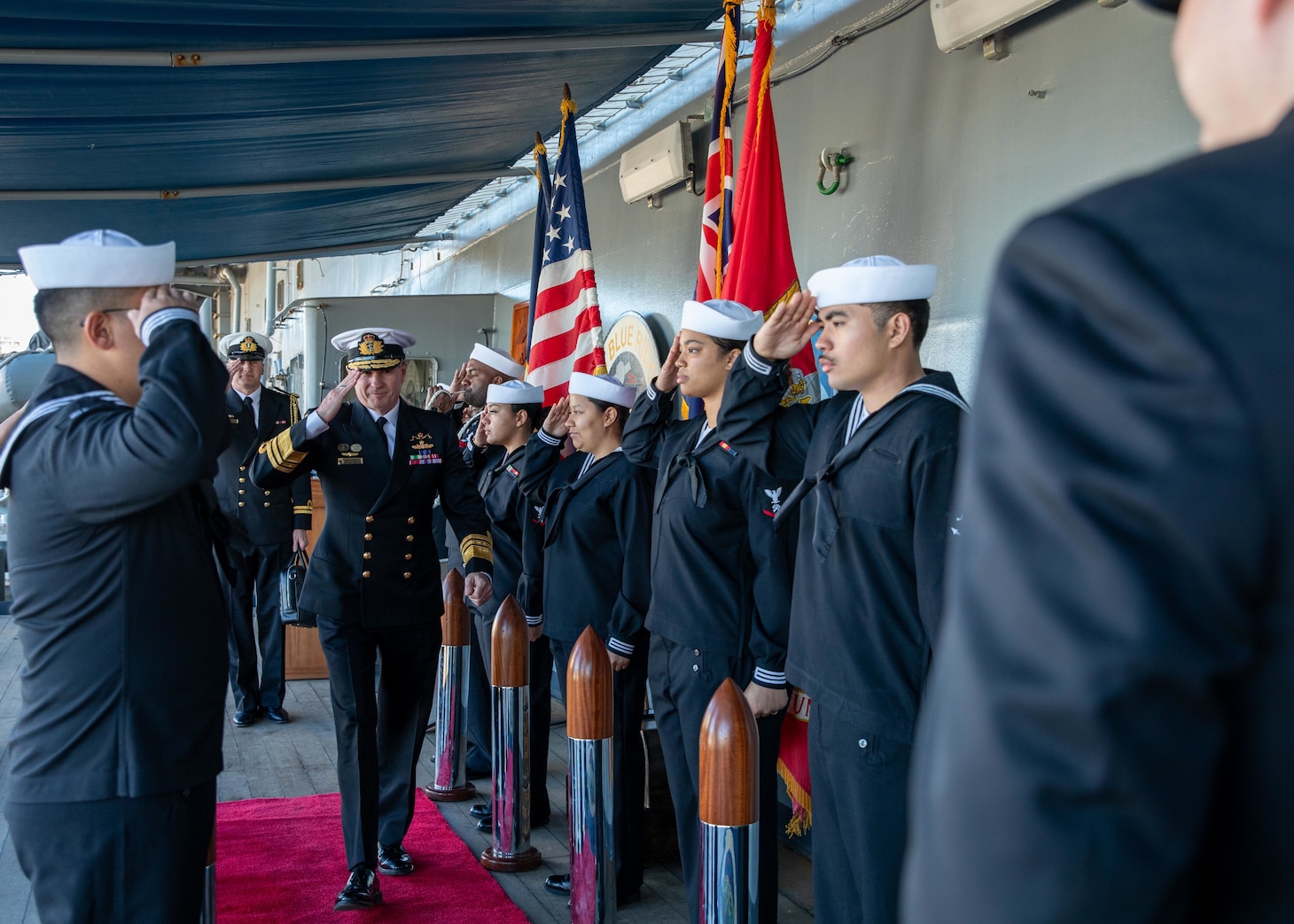 SYDNEY (May 28, 2025) Royal Australian Chief of Navy Vice Adm. Mark Hammond, AO, of the Royal Australia Navy is greeted by U.S. 7th Fleet Commander Vice Adm. Fred Kacher on the quarterdeck of the 7th Fleet flagship USS Blue Ridge (LCC 19) while the ship is conducting a scheduled port call in Sydney, May 28, 2025. U.S. 7th Fleet is the U.S. Navy's largest forward-deployed numbered fleet, and routinely interacts and operates with allies and partners in preserving a free and open Indo-Pacific region. (U.S. Navy Photo by Mass Communication Specialist 2nd Class Belen Saldana)