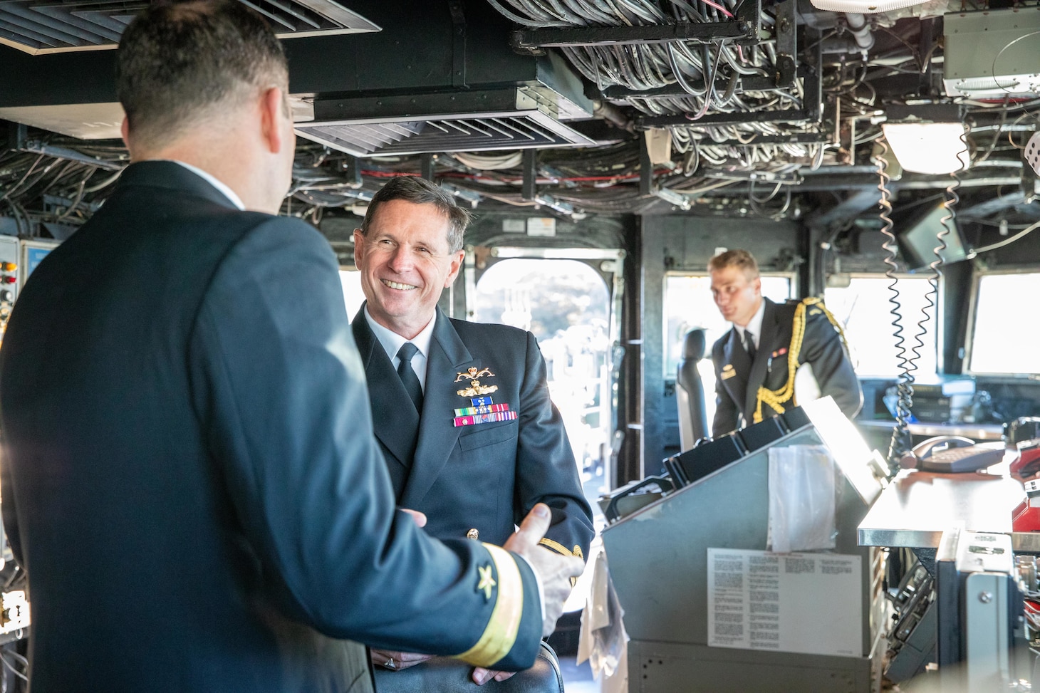 SYDNEY (May 28, 2025) Royal Australian Chief of Navy Vice Adm. Mark Hammond, AO, of the Royal Australia Navy speaks with Rear Adm. Kyle Gantt, deputy commander of U.S. 7th Fleet, during a tour of the 7th Fleet flagship USS Blue Ridge (LCC 19) while the ship is conducting a scheduled port call in Sydney, May 28, 2025. U.S. 7th Fleet is the U.S. Navy's largest forward-deployed numbered fleet, and routinely interacts and operates with allies and partners in preserving a free and open Indo-Pacific region. (U.S. Navy Photo by Mass Communication Specialist 2nd Class Belen Saldana)