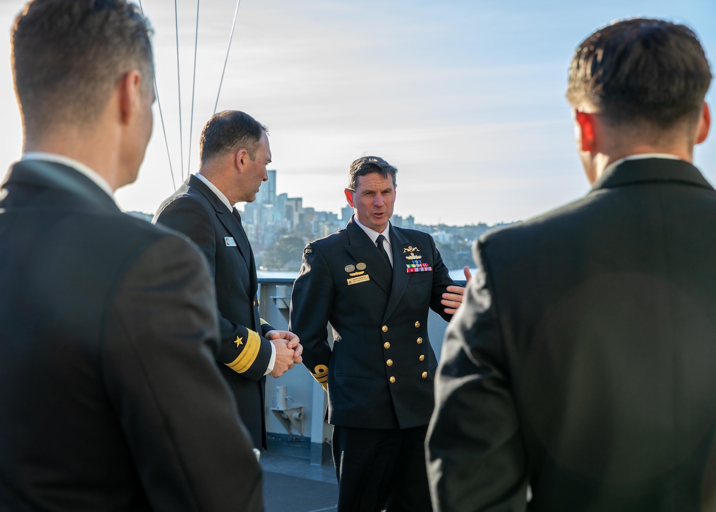 SYDNEY (May 28, 2025) Royal Australian Chief of Navy Vice Adm. Mark Hammond, AO, of the Royal Australia Navy speaks with Rear Adm. Kyle Gantt, deputy commander of U.S. 7th Fleet, during a tour of the 7th Fleet flagship USS Blue Ridge (LCC 19) while the ship is conducting a scheduled port call in Sydney, May 28, 2025. U.S. 7th Fleet is the U.S. Navy's largest forward-deployed numbered fleet, and routinely interacts and operates with allies and partners in preserving a free and open Indo-Pacific region. (U.S. Navy Photo by Mass Communication Specialist 2nd Class Belen Saldana)
