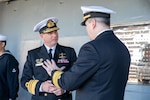 SYDNEY (May 28, 2025) Royal Australian Chief of Navy Vice Adm. Mark Hammond AO, of the Royal Australia Navy is greeted by U.S. 7th Fleet Commander Vice Adm. Fred Kacher on the quarterdeck of the 7th Fleet flagship USS Blue Ridge (LCC 19) while the ship is conducting a scheduled port call in Sydney, May 28, 2025. U.S. 7th Fleet is the U.S. Navy's largest forward-deployed numbered fleet, and routinely interacts and operates with allies and partners in preserving a free and open Indo-Pacific region. (U.S. Navy Photo by Mass Communication Specialist 2nd Class Belen Saldana)