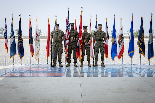 U.S. Marines with U.S. Marine Corps Forces Korea present the colors during the MARFORK 30th anniversary and colors and rededication ceremony  at U.S. Army Garrison Humphreys, South Korea, May 29, 2025. MARFORK was activated on June 1, 1995, at Seoul, Republic of Korea to support U.S. Marine Corps operations, strengthen interoperability with the Republic of Korea Marine Corps and serve as the U.S. Marine Corps service component for United States Forces Korea and United Nations Command. (U.S. Marine Corps photo by Cpl. Nikolas Mascroft)