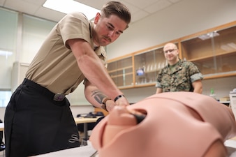 U.S. Navy Hospital Corpsman 3rd Class Garrett Whittemore, a field medical service technician with 2nd Medical Battalion, and a native of Ocean Springs, Mississippi, inserts a chest tube in a simulated patient at Marine Corps Base Camp Lejeune, North Carolina, May 30, 2025. Whittemore’s command selected him for warrior of the week for his work ethic, high standard of patient care, and his constant hunger to learn more, constantly pushing himself, his peers and his superiors to better themselves. Each week, 2nd MLG recognizes one outstanding Marine or Sailor that goes above and beyond in their duties and embodies the qualities of an outstanding service member. (U.S. Marine Corps Photo by Cpl. Jessica J. Mazzamuto)