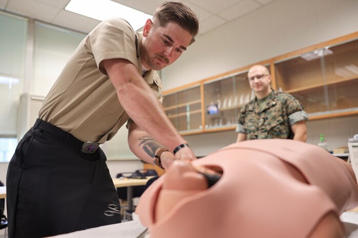 U.S. Navy Hospital Corpsman 3rd Class Garrett Whittemore, a field medical service technician with 2nd Medical Battalion, and a native of Ocean Springs, Mississippi, inserts a chest tube in a simulated patient at Marine Corps Base Camp Lejeune, North Carolina, May 30, 2025. Whittemore’s command selected him for warrior of the week for his work ethic, high standard of patient care, and his constant hunger to learn more, constantly pushing himself, his peers and his superiors to better themselves. Each week, 2nd MLG recognizes one outstanding Marine or Sailor that goes above and beyond in their duties and embodies the qualities of an outstanding service member. (U.S. Marine Corps Photo by Cpl. Jessica J. Mazzamuto)