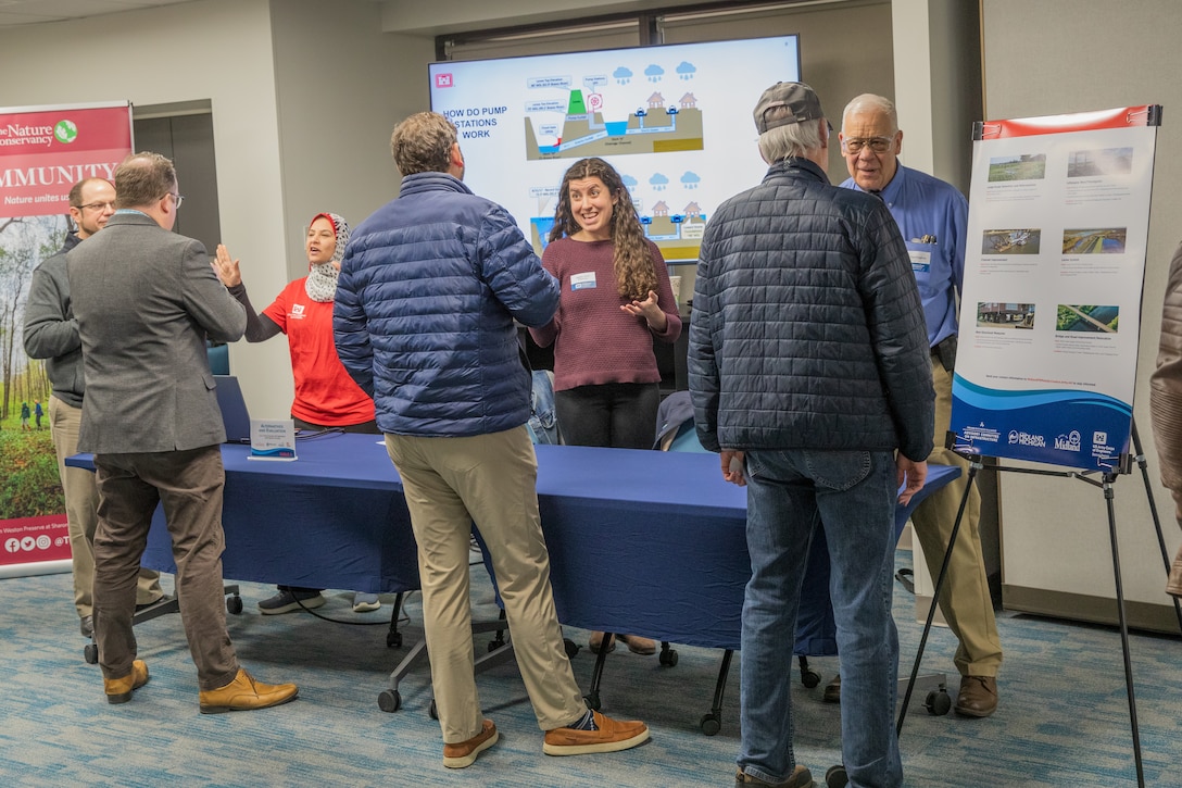 The U.S. Army Corps of Engineers, Detroit District, received $1.4 million in additional funding under the Fiscal Year 2025 Work Plan to continue its Tittabawassee Watershed Flood Risk Management Study. The study began in 2025 with public outreach events, including an open house on March 20, as seen here with Detroit District staff meeting with residents in Midland, Michigan. (U.S. Army Corps of Engineers photo.)
