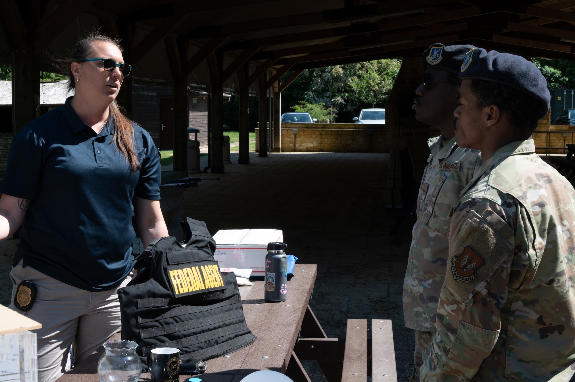 An Office of Special Investigations (OSI) Special Agent talks with Pathfinders