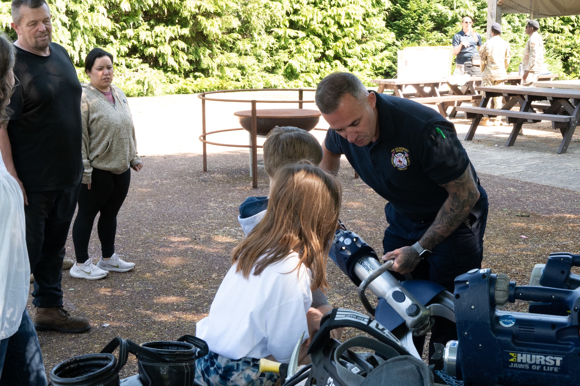 Richard Stanley, 422nd Firefighter and Emergency services (FES) firefighter, demonstrates rescue gear