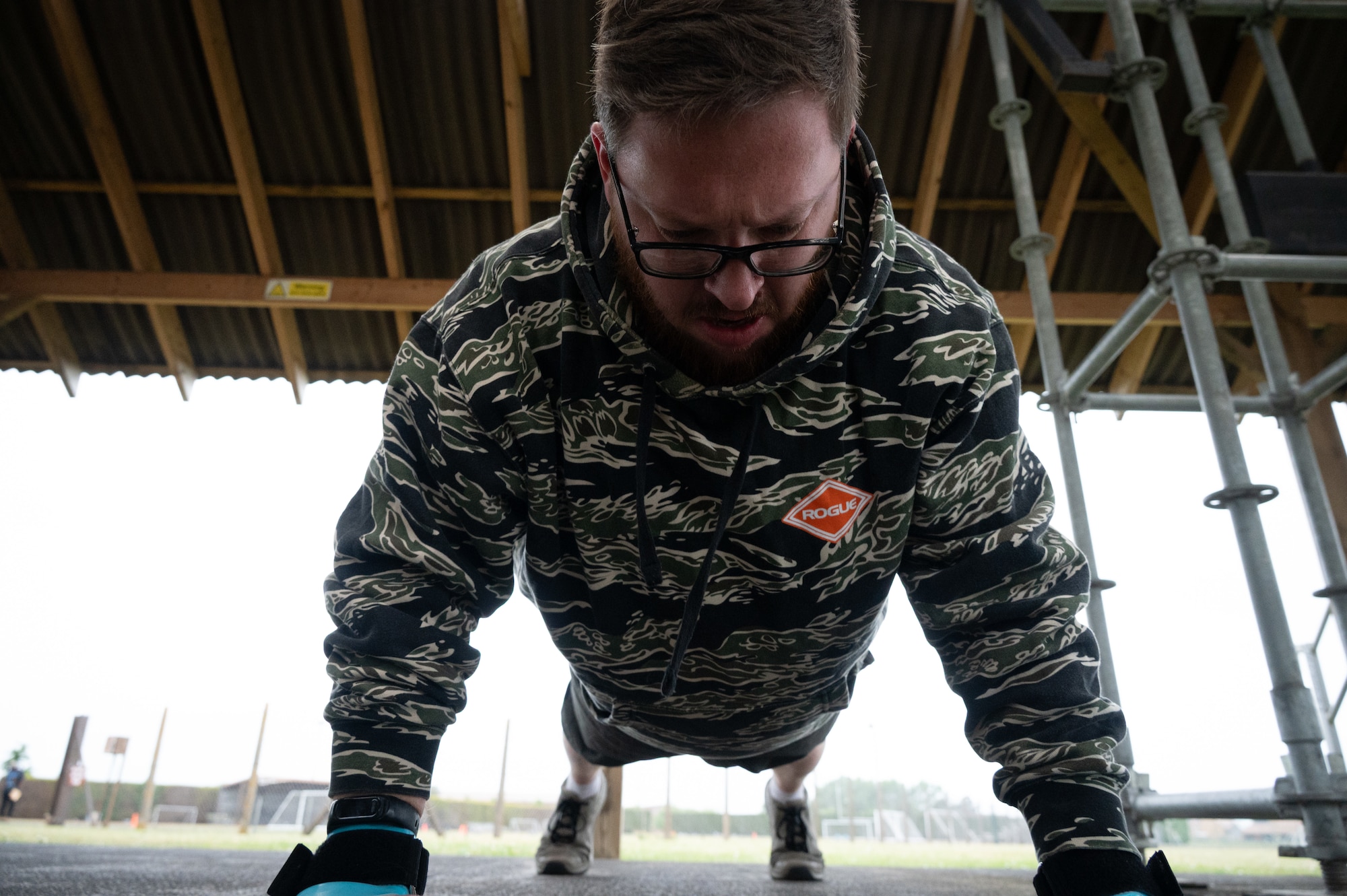 Luke Young, 423rd Air Base Squadron (ABS) resource protection program manager, preforms pushups
