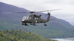 An HH-60M Black Hawk helicopter from Golf Co., 2-211th General Support Aviation Battalion conducts a training mission May 31, 2023. The Black Hawk departed Bryant Army Airfield on Joint Base Elmendorf-Richardson to complete aircrew qualification tasks medevac and hoist operations as well as basic flight maneuvers near Colony Glacier.