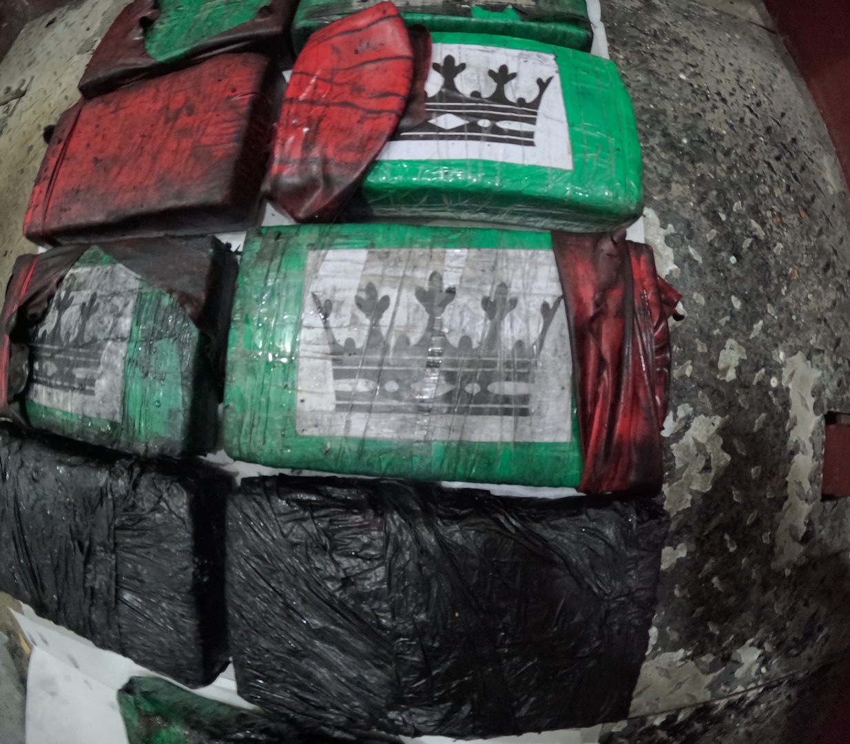 Coast Guard Cutter Diligence (WMEC 616) crew members seize approximately 40 pounds of cocaine from a disabled sailing vessel in the Caribbean Sea, April 24, 2025. Diligence's crew conducted a 61-day counter-drug and fisheries patrol in the Caribbean Sea and Gulf of America. (U.S. Coast Guard photo)