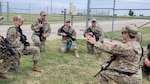Airmen from the 139th Security Forces Squadron, Missouri Air National Guard, conduct air base defense operations at Smoky Hill Air National Guard Range near Salina, Kansas, on May 18, 2025. More than 160 Airmen from five ANG units participated in Exercise Tinman 25, a large-scale readiness exercise designed to sharpen air base defense skills through realistic, 24-hour operations.
