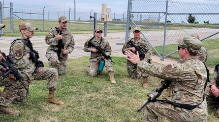 Airmen from the 139th Security Forces Squadron, Missouri Air National Guard, conduct air base defense operations at Smoky Hill Air National Guard Range near Salina, Kansas, on May 18, 2025.
