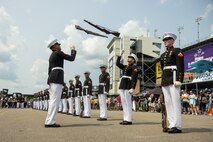 U.S. Marines with the United States Marine Corps Silent Drill Platoon execute their "double inspection" sequence during their performance at the Cracker Barrel 400 brand activation during Marine Week Nashville 2025 at the Nashville Superspeedway, Nashville, Tennessee, June 1, 2025. Founded on November 10, 1775, the United States Marine Corps has served our nation honorably in every clime and place for 250 years. Throughout 2025, Marines across the globe will celebrate the 250th birthday of the Corps, commemorating service, sacrifice, and priding themselves on living 'Semper Fidelis' or 'Always Faithful' to their nation and to each other. (U.S. Marine Corps photo by Lance Cpl. Judith Ann Lazaro)