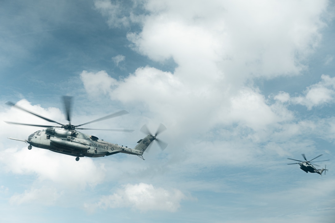 U.S. Marines with Marine Medium Tiltrotor Squadron 263 (Reinforced), 22nd Marine Expeditionary Unit, evacuate U.S citizens during a simulated non-combatant evacuation operation, as part of Iwo Jima Amphibious Ready Group Marine Expeditionary Unit exercise, at Marine Corps Base Stone Bay, North Carolina, May 28, 2025. During ARGMEUEX, the 22nd MEU, aboard IWOARG shipping, conducts various mission essential tasks that enhance operational readiness and lethality as a unified IWOARG/22 MEU team. (U.S. Marine Corps photo by Cpl. Maurion Moore)