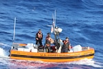 The crew members from Coast Guard Cutter Diligence recover jettisoned packages from a suspected drug smuggling vessel offshore of Puerto Oviedo, Dominican Republic, April 12, 2025. USCGC Venturous’ (WMEC 625) crew offloaded more than 1,294 pounds of cocaine and 4,012 pounds of marijuana valued at approximately $14.1 million intercepted in the Caribbean Sea. (U.S. Coast Guard photo)