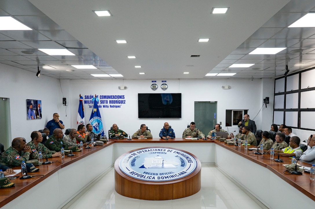 U.S. and Dominican Republic service members and Center of Emergency Operations personnel brief their capabilities during a Jaguar Sentinel knowledge exchange in Santo Domingo, Dominican Republic, May 7, 2025. Participants included civil engineers, emergency response medical, and communications specialists who worked together to synergistically come up with solutions to a simulated natural disaster. (U.S. Air Force photo by Staff Sgt. Sadie Colbert)