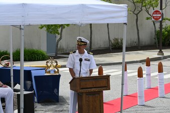 Cmdr. Dean Kang, prospective officer in charge Navy Medicine Readiness and Training Unit (NMRTU) Groton gives remarks during a change of charge ceremony held on board NMRTU Groton, Connecticut, May 27, 2025. Capt. John  Hoyos, was relieved by Cmdr. Dean Kang. Cmdr. Kang comes to NMRTU Groton from NMRTC Bremerton, where he served as the pharmacy department head. (U.S. Navy photo by Lt. Sydney Wall)