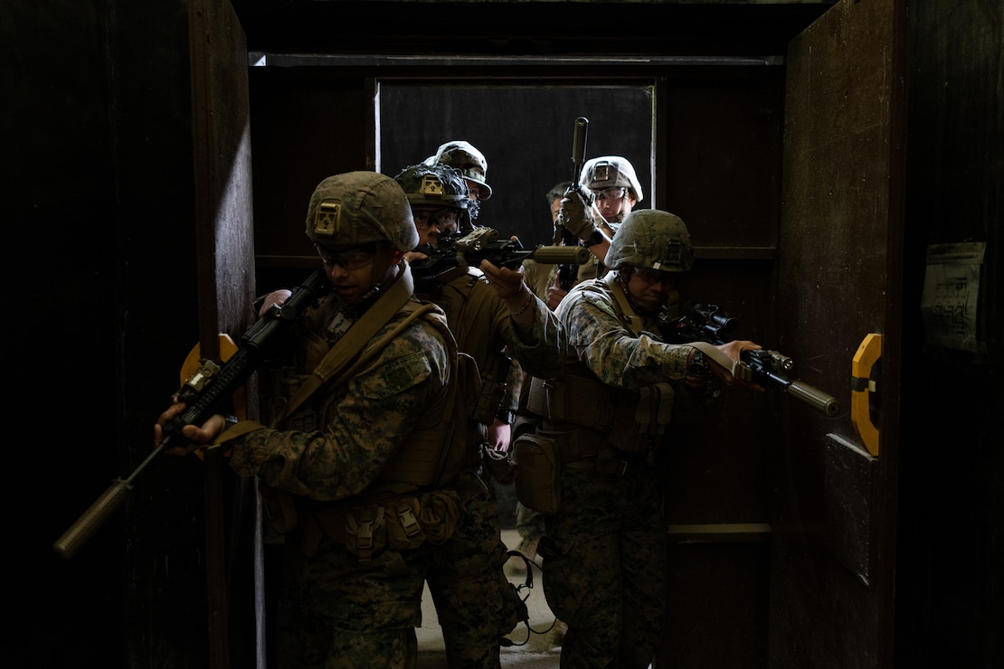 U.S. Marines with 2nd Battalion, 23rd Marines, forward deployed with 4th Marine Regiment, 3d Marine Division as part of the Unit Deployment Program, clear buildings during a live fire shoothouse as a part of military operations in urban terrain training during Korea Viper 25.4 at Camp Rodriguez, South Korea, May 24, 2025