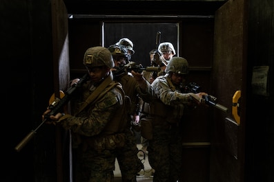 CAMP RODRIGUEZ, South Korea (May 24, 2025) — U.S. Marines with 2nd Battalion, 23rd Marines, forward deployed with 4th Marine Regiment, 3d Marine Division as part of the Unit Deployment Program, clear buildings during a live fire shoothouse as a part...