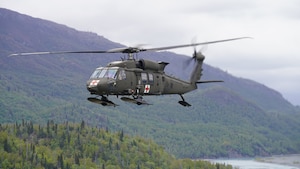 An HH-60M Black Hawk helicopter from Golf Co., 2-211th General Support Aviation Battalion conducts a training mission May 31, 2023.