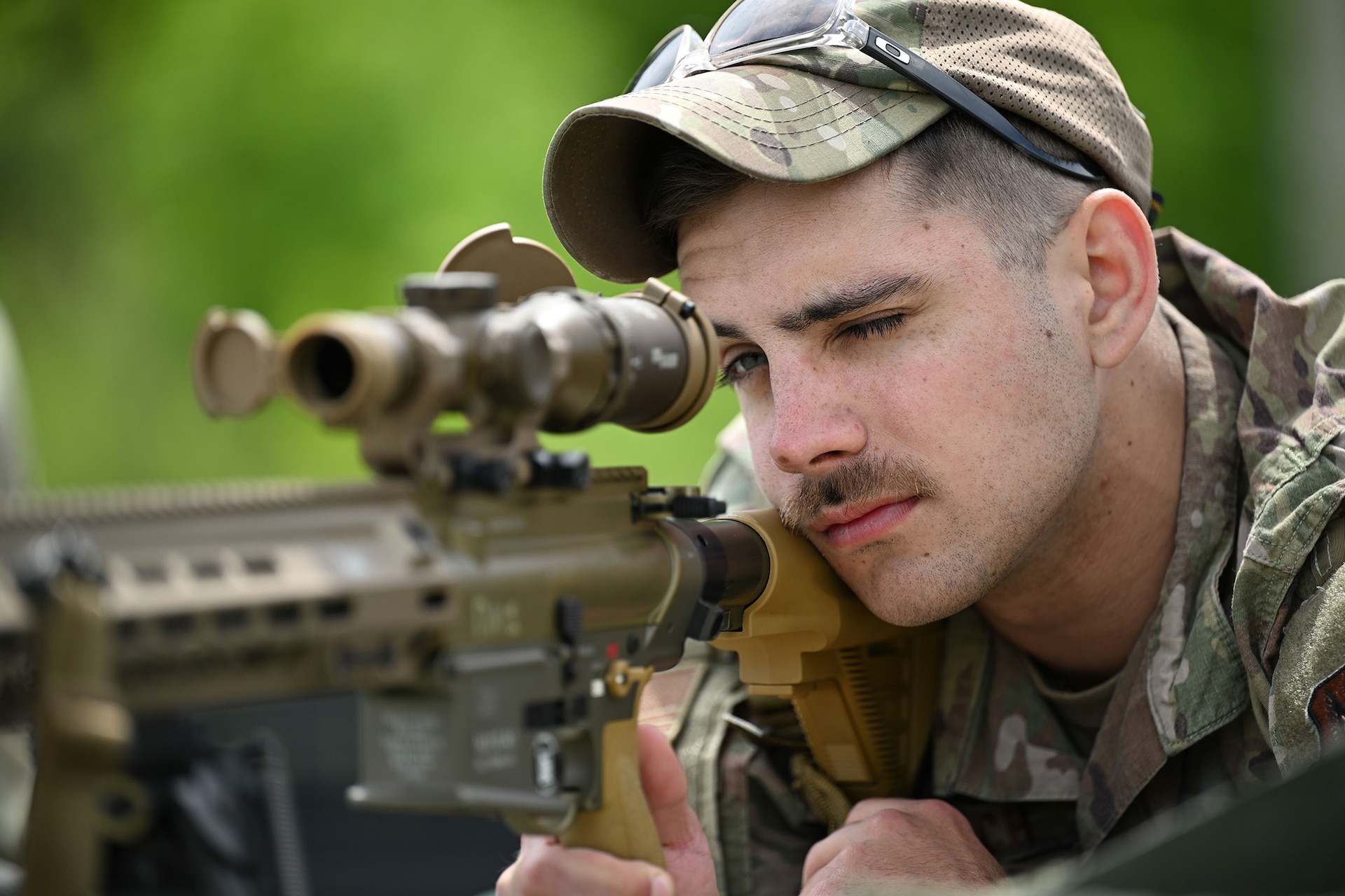 Staff Sgt Andrew Mach, assigned to 107th Attack Wing Security Forces Squadron, "zero's in" his M110A1 sniper rifle during annual heavy weapons qualification on May 20, 2025 at Fort Indiantown Gap PA.