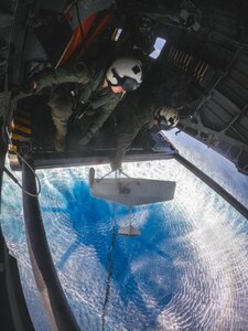 SEA OF JAPAN (May 19, 2025) – Chief Naval Aircrewman - Helicopter Bradley Caldbeck and Naval Aircrewman - Helicopter 2nd Class Michael Russo, both assigned to the “Blackhawks” of Helicopter Mine Countermeasures Squadron (HM) 15, stream a MK 103 Mechanical Minesweeping System from an MH-53E Sea Dragon off the coast of southern Japan, during Integrated Battle Problem 25.5, May 19, 2025. Exercises such as Integrated Battle Problem allow the Navy to demonstrate unmanned system operations in relevant experiment scenarios in order to meet service level objectives and operationalize unmanned systems and capabilities to maintain a secure and prosperous Indo-Pacific region. U.S. 7th Fleet, the U.S. Navy’s largest forward-deployed numbered fleet, which routinely interacts and operates with allies and partners in preserving a free and open Indo-Pacific region. (U.S. Navy photo by Chief Naval Aircrewman - Helicopter Bradley Caldbeck)