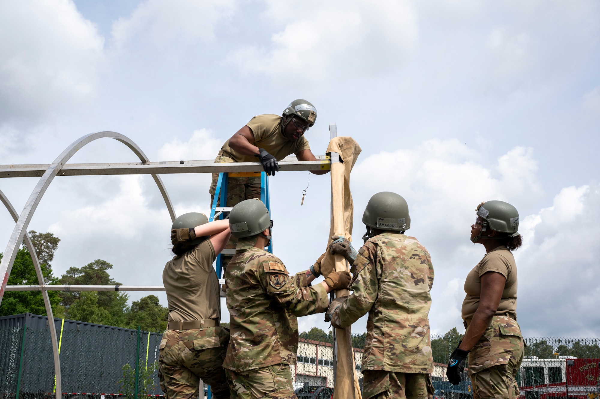 U.S. Airmen from the 52nd Force Support Squadron construct an Alaska Small Shelter System during Operation Steel at the 435th Construction and Training Squadron Compound near Ramstein Air Base, Germany, May 29, 2025.
