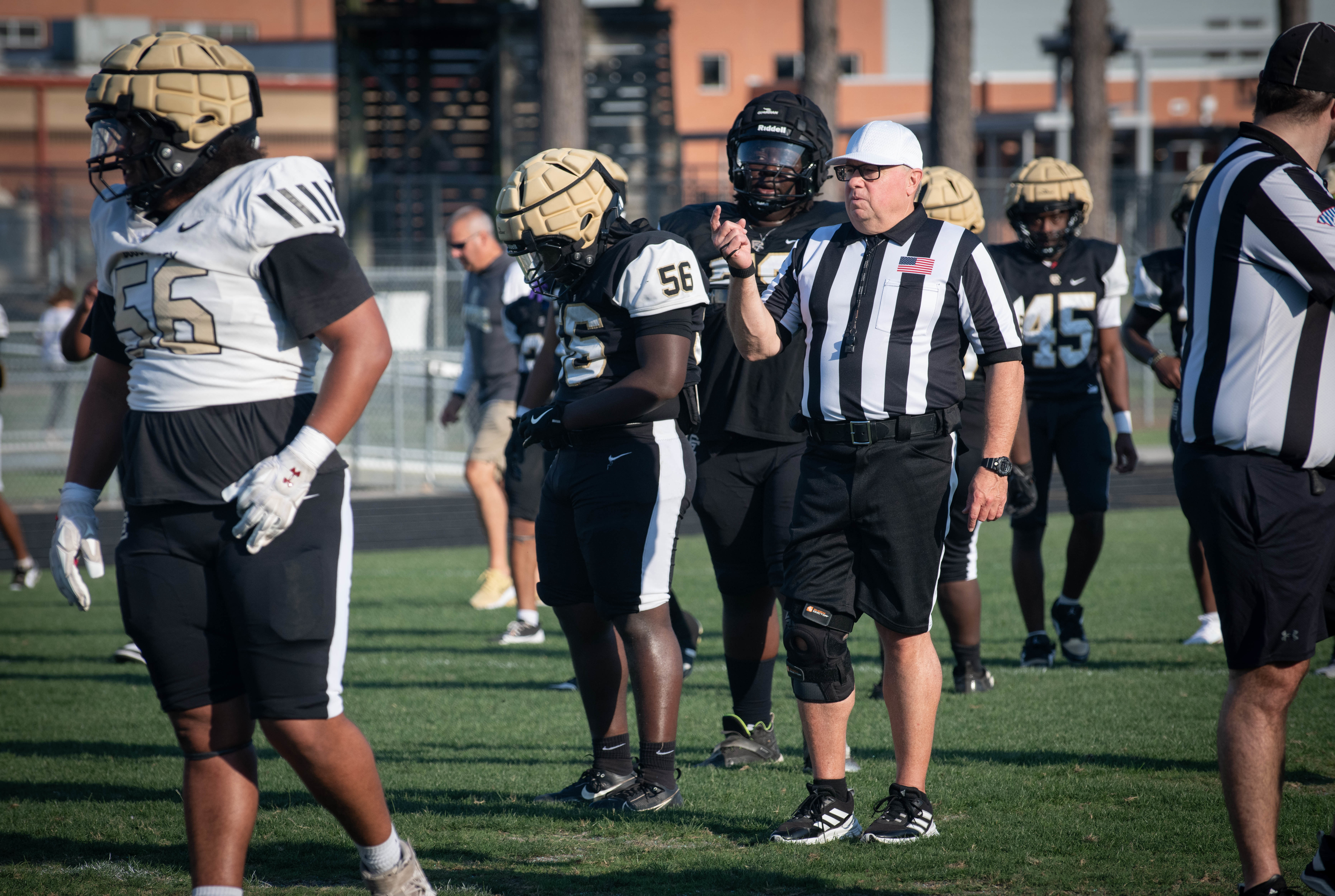 Darrell Denaux's impact spans from modernizing naval facilities at Naval Information Warfare Center Atlantic to shaping young lives on the football field. As facilities director, he oversees a $57 million budget and more than 120 facilities dedicated to delivering information warfare capabilities. For the past 13 years, he's also served as a high school football official, bringing his Navy leadership experience to the local community.
