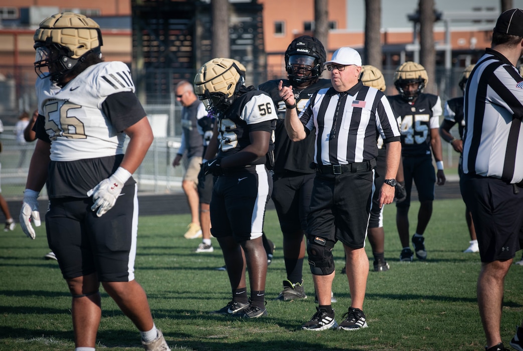 Darrell Denaux's impact spans from modernizing naval facilities at Naval Information Warfare Center Atlantic to shaping young lives on the football field. As facilities director, he oversees a $57 million budget and more than 120 facilities dedicated to delivering information warfare capabilities. For the past 13 years, he's also served as a high school football official, bringing his Navy leadership experience to the local community.
