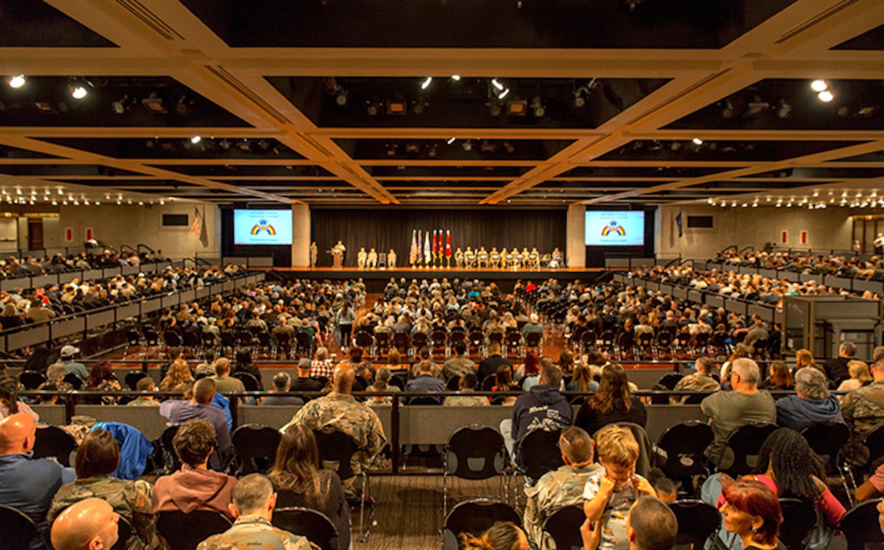 Soldiers of the New York Army National Guard's 42nd Infantry Division and their family members fill the Empire State Convention Center in Albany during a farewell ceremony held on June 1, 2025.
