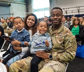 A New York Army National Guard Soldier assigned to the 42nd Infantry Division and his family attend the farewell ceremony held at the Nassau County Police Academy in Barden City on June 1, 2025.