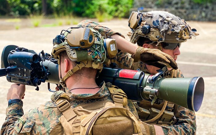 U.S. Marine Corps Cpl. Carson Carey, rear, a rocketeer assigned to Bravo Company, Battalion Landing Team 1/5, 15th Marine Expeditionary Unit, conducts back blast area procedures for an 84 mm multi-role, anti-armor, anti-personnel weapon system during a live-fire range with Philippine Marines assigned to Marine Battalion Landing Team 11, 3rd Marine Brigade, as part of exercise KAMANDAG 8 at Naval Detachment Oyster Bay, Palawan Province, Philippines, Oct. 17, 2024.