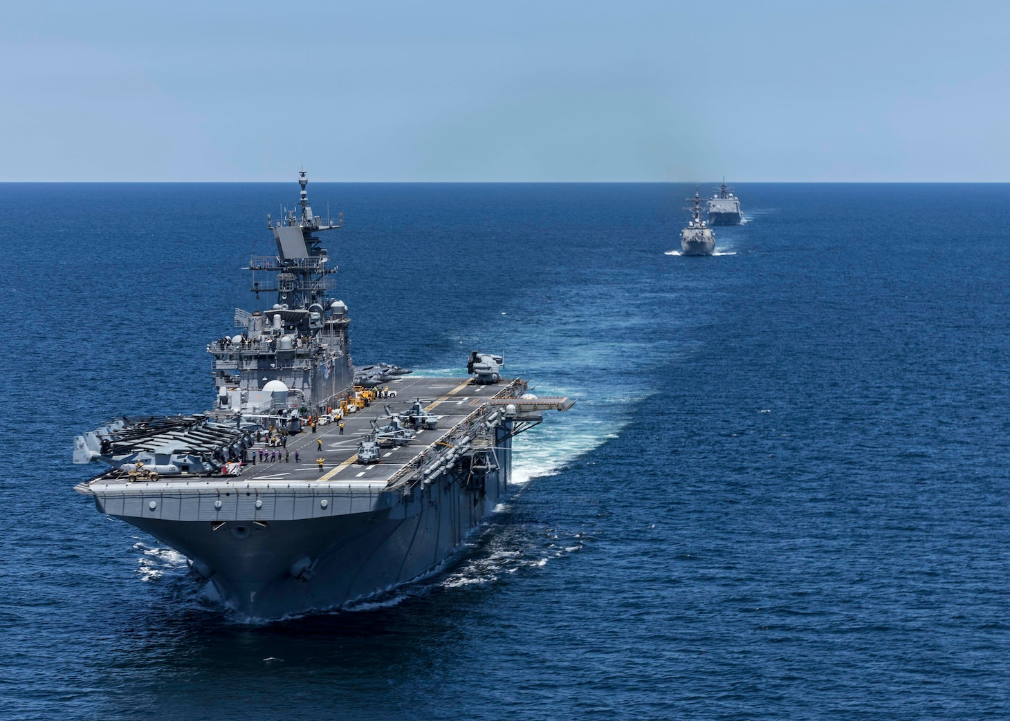 ATLANTIC OCEAN (May 22, 2025) The Wasp-class amphibious assault ship USS Iwo Jima (LHD 7), the Arleigh Burke-class guided missile destroyer USS Gonzalez (DDG 66), and the San Antonio-class amphibious transport dock ships USS Fort Lauderdale (LPD 28) sail in formation during a simulated strait transit. The Iwo Jima Amphibious Ready Group (ARG) and 22nd Marine Expeditionary Unit (MEU) are conducting ARGMEUEX which prepares integrated naval task forces for sustained, high-end Joint and combined combat. Integrated naval training provides combatant commanders and the Commander-in-Chief highly capable forces that deter adversaries, underpin American security and economic prosperity, and reassure Allies and partners. (U.S. Navy photo by Mass Communication Specialist Seaman Andrew Eggert)