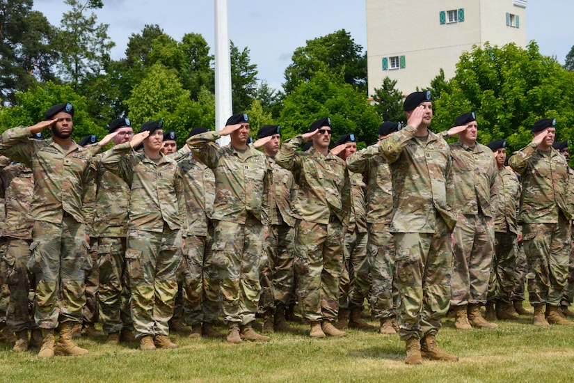 U.S. Soldiers with the 56th Stryker Brigade Combat Team, 28th Infantry Division, Pennsylvania National Guard in support of the Joint Multinational Training Group-Ukraine mission stand in formation behind U.S. Army Capt. Bryan Beatty, commander of the Headquarters and Headquarters Company, 56th SBCT during the transfer of authority ceremony at Tower Barracks, Grafenwoehr, Germany, June 1, 2025. The 56th SBCT is relinquishing oversight of the JMTG-U mission to the 278th Armored Cavalry Regiment, Tennessee National Guard. (U.S. Army National Guard photo by Spc. Israel Fernandez)