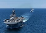 ATLANTIC OCEAN (May 22, 2025) The Wasp-class amphibious assault ship USS Iwo Jima (LHD 7), the Arleigh Burke-class guided missile destroyer USS Gonzalez (DDG 66), and the San Antonio-class amphibious transport dock ships USS Fort Lauderdale (LPD 28) sail in formation during a simulated strait transit. The Iwo Jima Amphibious Ready Group (ARG) and 22nd Marine Expeditionary Unit (MEU) are conducting ARGMEUEX which prepares integrated naval task forces for sustained, high-end Joint and combined combat. Integrated naval training provides combatant commanders and the Commander-in-Chief highly capable forces that deter adversaries, underpin American security and economic prosperity, and reassure Allies and partners. (U.S. Navy photo by Mass Communication Specialist Seaman Andrew Eggert)