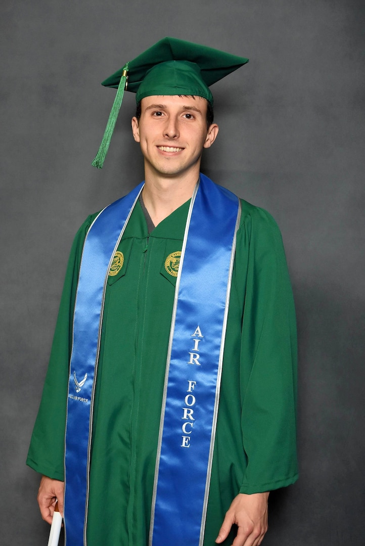 Senior Airman Corbin Phillips, crew chief within the 113th Wing Maintenance Squadron, D.C. Air National Guard, stands for a photograph during a commencement ceremony, in Fairfax, VA, on May 15, 2025. SrA Phillips completed a Bachelor of Science in Systems and Industrial Engineering with the assistance of the District of Columbia National Guard Tuition Assistance Program.