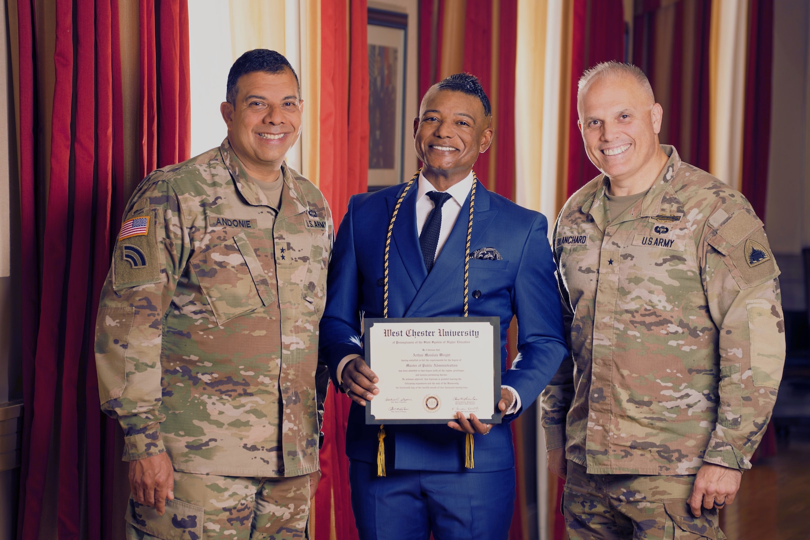 Maj. Gen. John C. Andonie, Commanding General (Interim) for the D.C. National Guard; Brig. Gen. Leland D. Blanchard II, the Adjutant General for the D.C. National Guard, and Master Sgt. Arthur Mondale Wright, State Public Affairs Officer, stand for a photograph at the D.C. Armory, in Washington D.C., on May 21, 2025. Master Sgt. Wright earned his Master of Public Administration with the assistance of the District of Columbia National Guard Tuition Assistance Program.