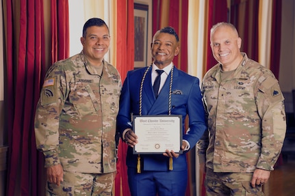 Maj. Gen. John C. Andonie, Commanding General (Interim) for the D.C. National Guard; Brig. Gen. Leland D. Blanchard II, the Adjutant General for the D.C. National Guard, and Master Sgt. Arthur Mondale Wright, State Public Affairs Officer, stand for a photograph at the D.C. Armory, in Washington D.C., on May 21, 2025. Master Sgt. Wright earned his Master of Public Administration with the assistance of the District of Columbia National Guard Tuition Assistance Program.