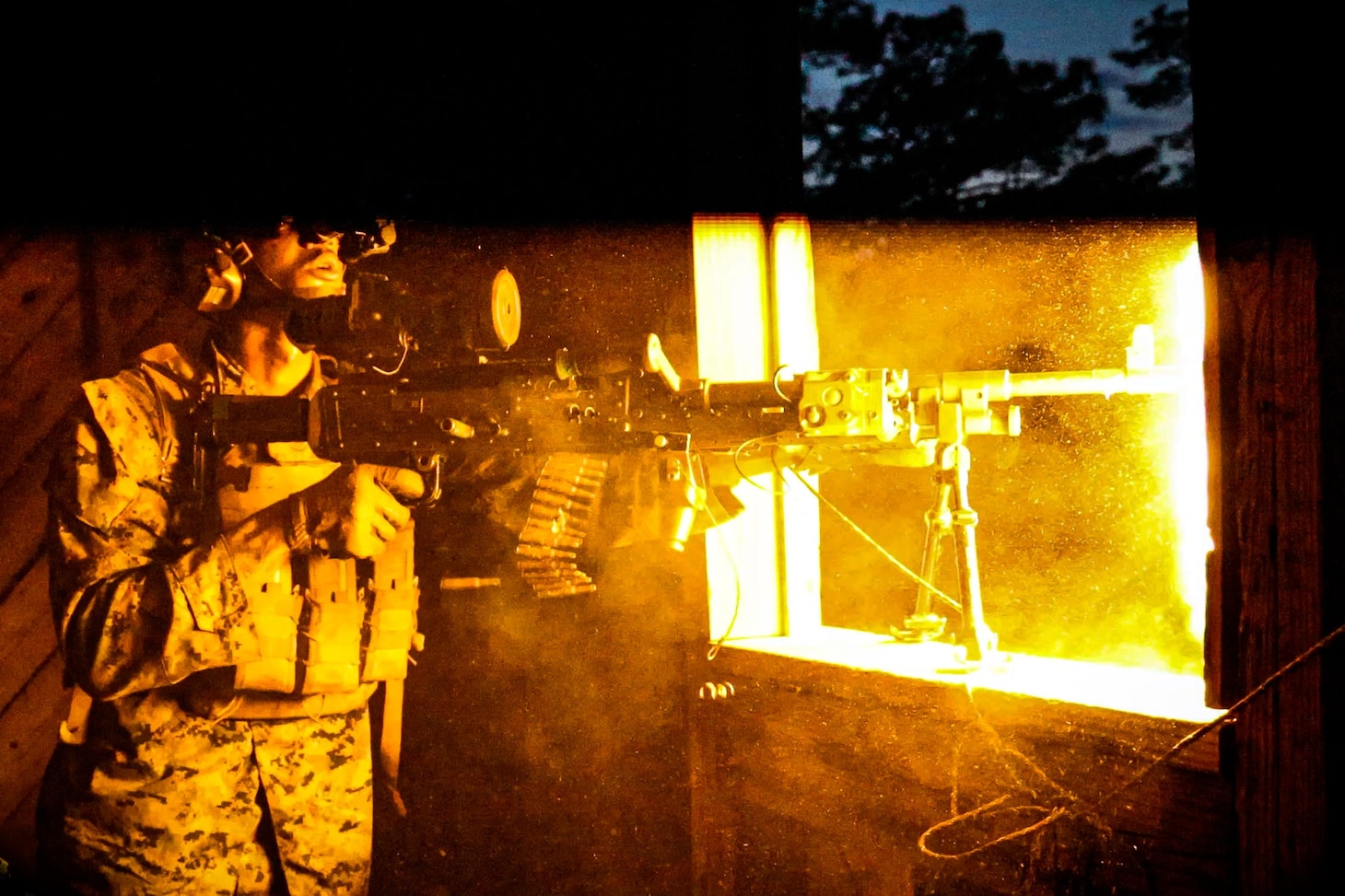 U.S. Marine Corps Lance Cpl. Joshua Ortiz, a rifleman with Kilo Company, Battalion Landing Team 3/6, 22nd Marine Expeditionary Unit, fires an M240B machine gun during a simulated raid from aboard the U.S. Navy Wasp-class amphibious assault ship USS Iwo Jima (LHD 7), in support of Iwo Jima Amphibious Ready Group Marine Expeditionary Unit Exercise (ARGMEUEX) while underway in the Atlantic Ocean, May 20, 2025.