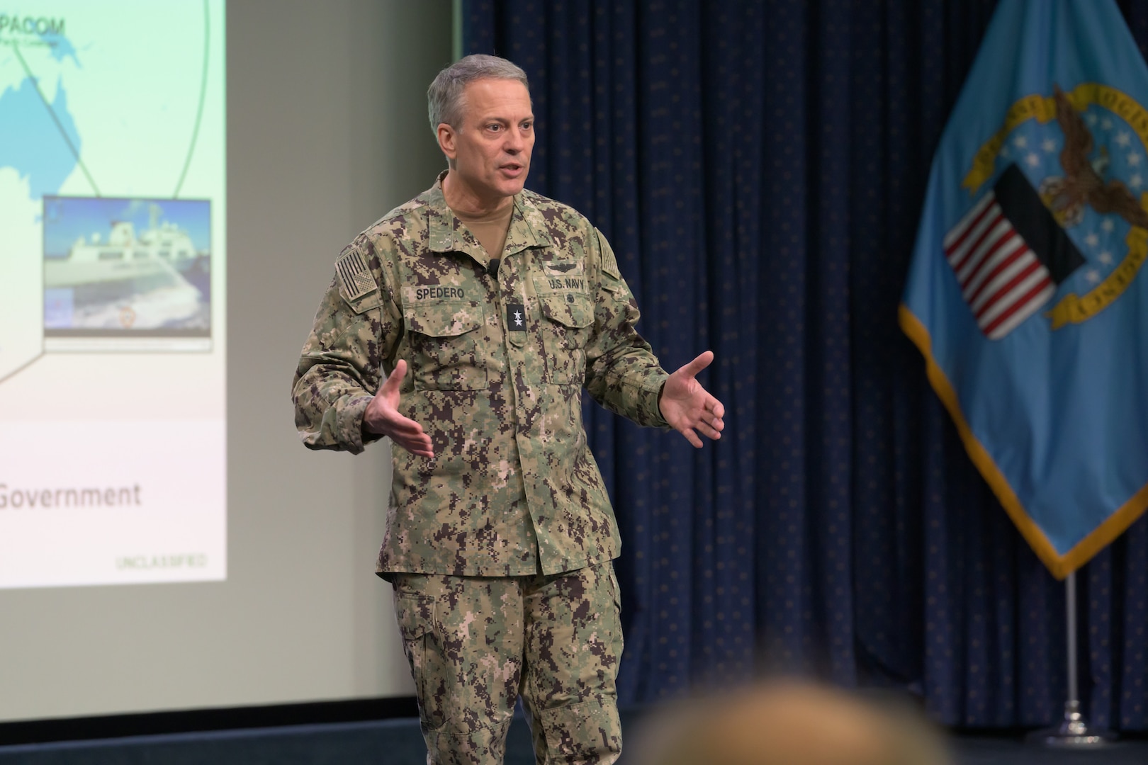 Joint Staff Vice Director for Operations Rear Adm. Paul C. Spedero Jr. speaks to Defense Logistics Agency employees