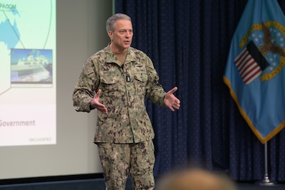Joint Staff Vice Director for Operations Rear Adm. Paul C. Spedero Jr. speaks to Defense Logistics Agency employees