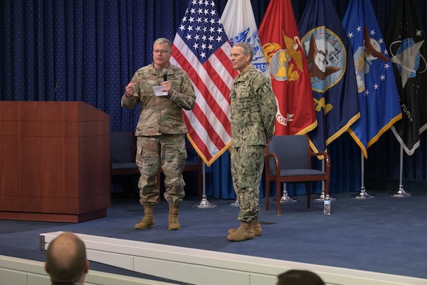 Defense Logistics Agency Director Army Lt. Gen. Mark Simerly, left, thanked Joint Staff Vice Director for Operations Rear Adm. Paul C. Spedero Jr. after a Campaign of Learning Warfighter Talk about challenges and opportunities in the operational environmen