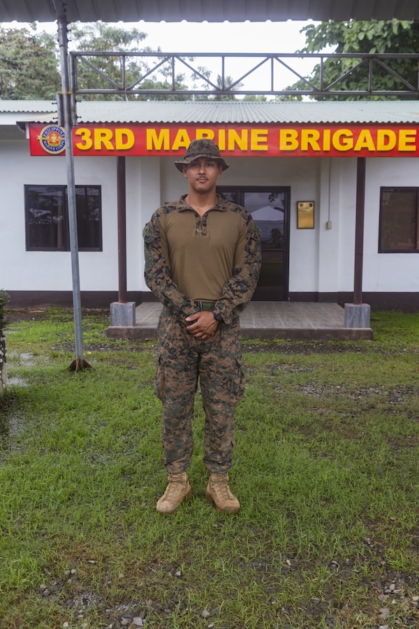 U.S. Marine Corps Lance Cpl. Christian Diaz, a satellite transmission systems operator with Combat Logistics Battalion 1, Marine Rotational Force - Darwin 25.3, poses for a photo at Palawan, Philippines, during Exercise KAMANDAG 9, May 25, 2025. KAMANDAG is an annual Philippine Marine Corps and U.S. Marine Corps-led exercise aimed at enhancing the Armed Forces of the Philippines’ defense and humanitarian capabilities by providing valuable training in combined operations with foreign militaries in the advancement of a Free and Open Indo-Pacific. MRF-D 25.3 is part of an annual six-month rotational deployment to enhance interoperability with the Australian Defence Force and Allies and partners and provide a forward-postured crisis response force in the Indo-Pacific. Diaz is a native of Florida. (U.S. Marine Corps photo by Cpl. Keegan Jones)