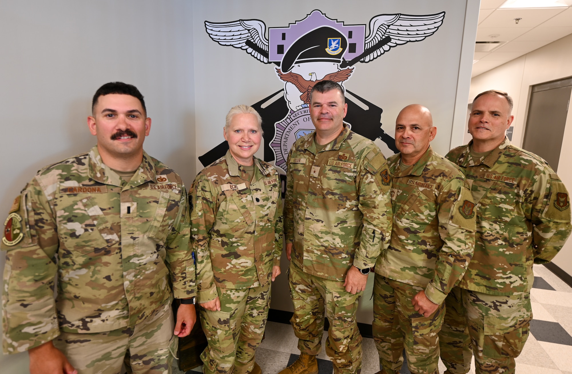 Brig. Gen. Brian A. Filler, Director of Security Forces, Deputy Chief of Staff for Logistics, Engineering and Force Protection, Headquarters U.S. Air Force, poses for a photo with 433rd Security Forces Squadron senior leaders during a visit to the 433rd SFS at Joint Base San Antonio-Lackland, Texas, May 3, 2025.