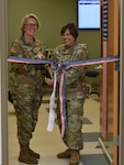 Col. Stephanie Mont, Womack Army Medical Center Hospital Commander and Lt. Col. (P) Melissa Folsom, director, Rehabilitation Services cut ribbon during May 14 ceremony. Clark Health Clinic Ribbon Cutting ceremony celebrates a nearly decades-long initiative to establish full scope Physical Therapy services embedded within the Clark Health Clinic, allowing Soldiers to complete their medical services within one footprint, Womack Army Medical Center, Fort Bragg, North Carolina