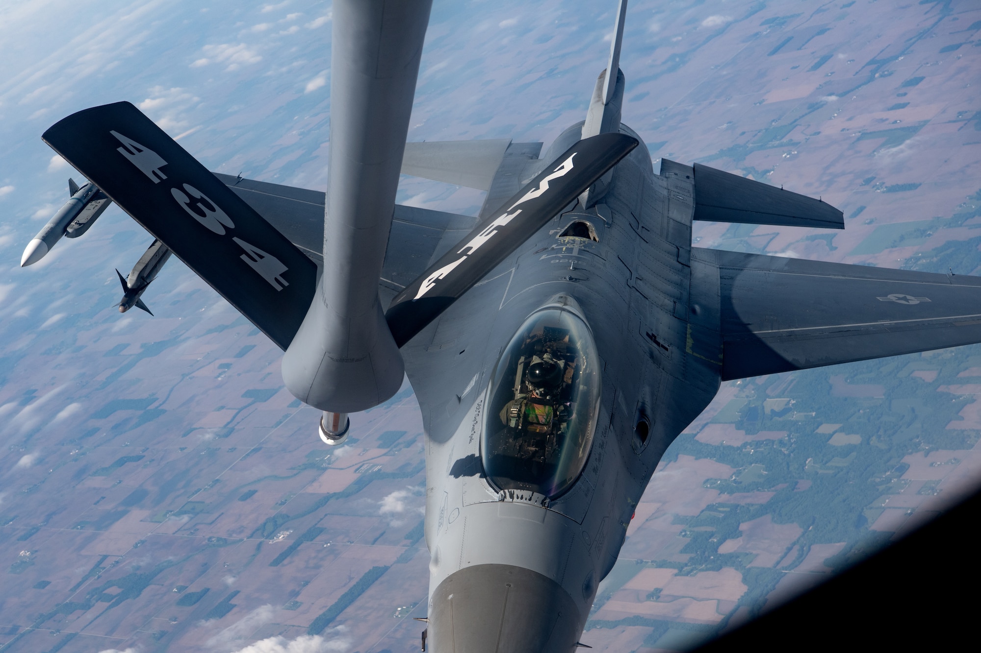 An F-16 Fighting Falcon from the 122 nd Fighter Wing, Fort Wayne, Ind., approaches a KC-135R Stratotanker from the 434 th Air Refueling Wing, for fuel during an Indiana state legislator’s flight over central Indiana May 29, 2025. Indiana state legislators from across the state visited Grissom for a tour of the base, an insight of its current and future mission capabilities, and to meet with the Airmen behind the day-to-day operations of the Wing. (U.S. Air Force photo/Ben Mota)