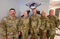 Brig. Gen. Brian A. Filler, Director of Security Forces, Deputy Chief of Staff for Logistics, Engineering and Force Protection, Headquarters U.S. Air Force, poses for a photo with 433rd Security Forces Squadron senior leaders during a visit to the 433rd SFS at Joint Base San Antonio-Lackland, Texas, May 3, 2025.