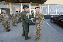 U.S. Air Force Brig. Gen. Brian A. Filler, Director of Security Forces, Deputy Chief of Staff for Logistics, Engineering and Force Protection, Headquarters U.S. Air Force, is greeted by U.S. Air Force Col. Douglas C. Jeffrey IV, Airlift Wing commander and other 433rd AW senior leaders assigned to the 433rd Mission Support Group during a visit to the 433rd Security Forces Squadron at Joint Base San Antonio-Lackland, Texas, May 3, 2025.