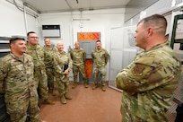Brig. Gen. Brian A. Filler, Director of Security Forces, Deputy Chief of Staff for Logistics, Engineering and Force Protection, Headquarters U.S. Air Force, meets with Citizen Airmen defenders during a tour of the 433rd SFS unit at Joint Base San Antonio-Lackland, Texas, May 3, 2025.