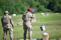 Two Airmen assigned to the 107th Attack Wing Security Forces Squadron begin qualification training with the M320 grenade launcher, May 20, 2025, Fort Indiantown Gap PA. The M320 offers many advantages from the typically used M203, namely in munition versatility, longer range, easier loading, and improved accuracy. New York Air National Guard photo by Capt Jason Carr